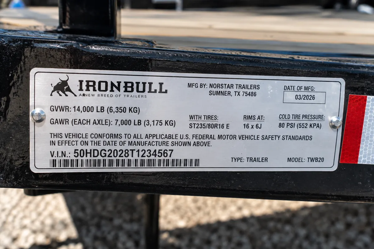 Close-up of a trailer VIN plate showing GVWR and gross axle weight ratings used to calculate trailer payload capacity.