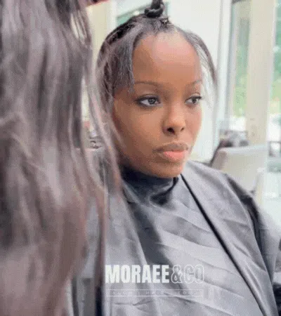 Natural-looking sew-in hair extensions installed at Salon Moraee in Atlanta with a seamless blend.