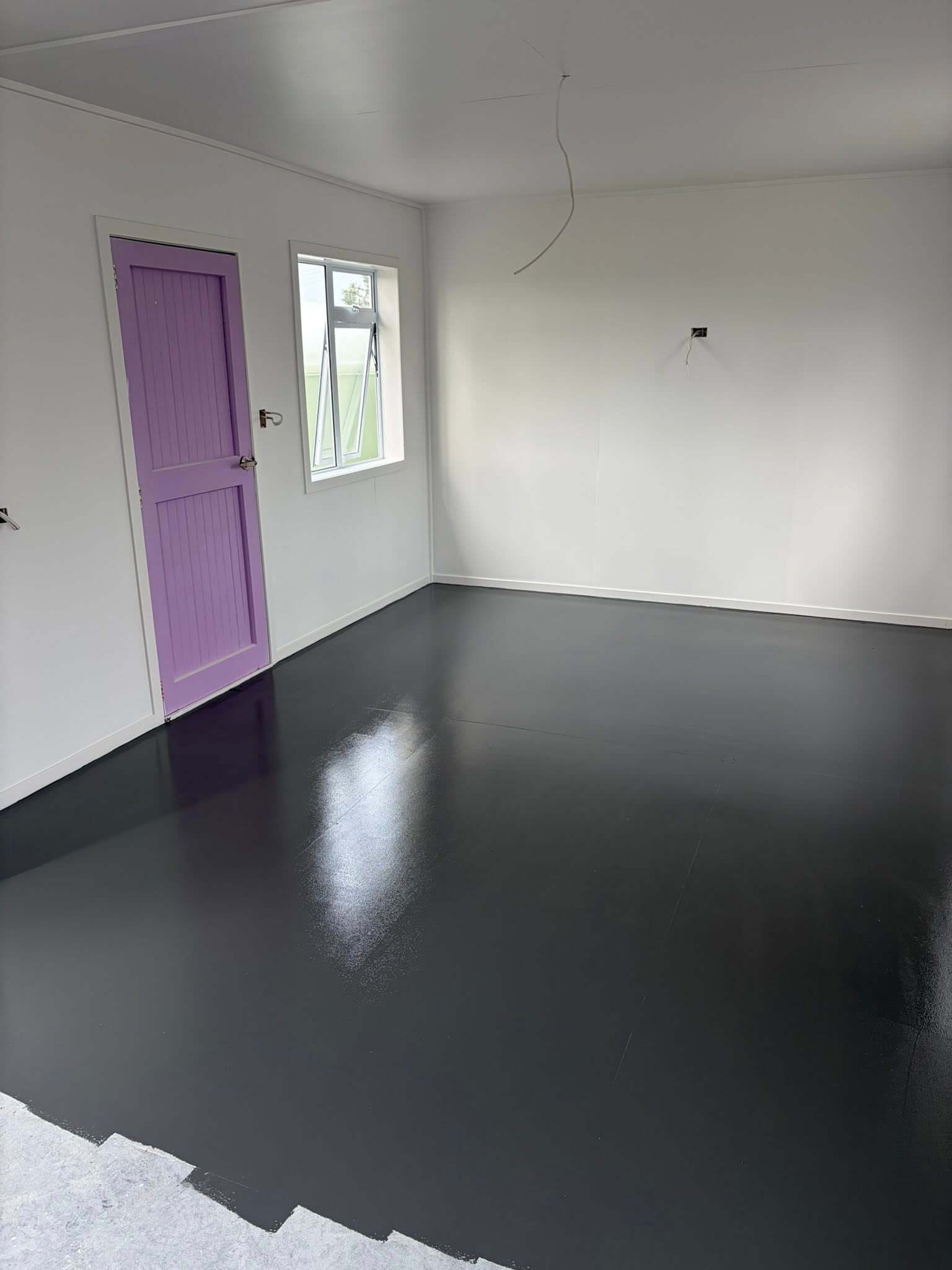 Interior floor painting and coating project completed by Hamilton painters