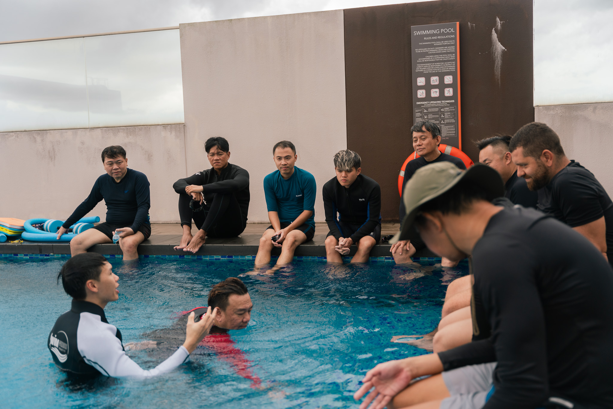 a pool of water with a window in the background