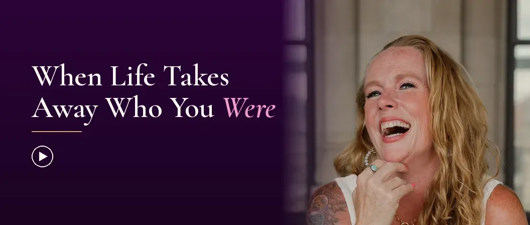 Becca Powers® laughing in a white top by tall loft windows, turned toward the title When Life Takes Away Who You Were. Watch on YouTube.