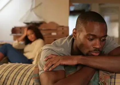 Couple sitting quietly together while struggling with emotional disconnection after betrayal