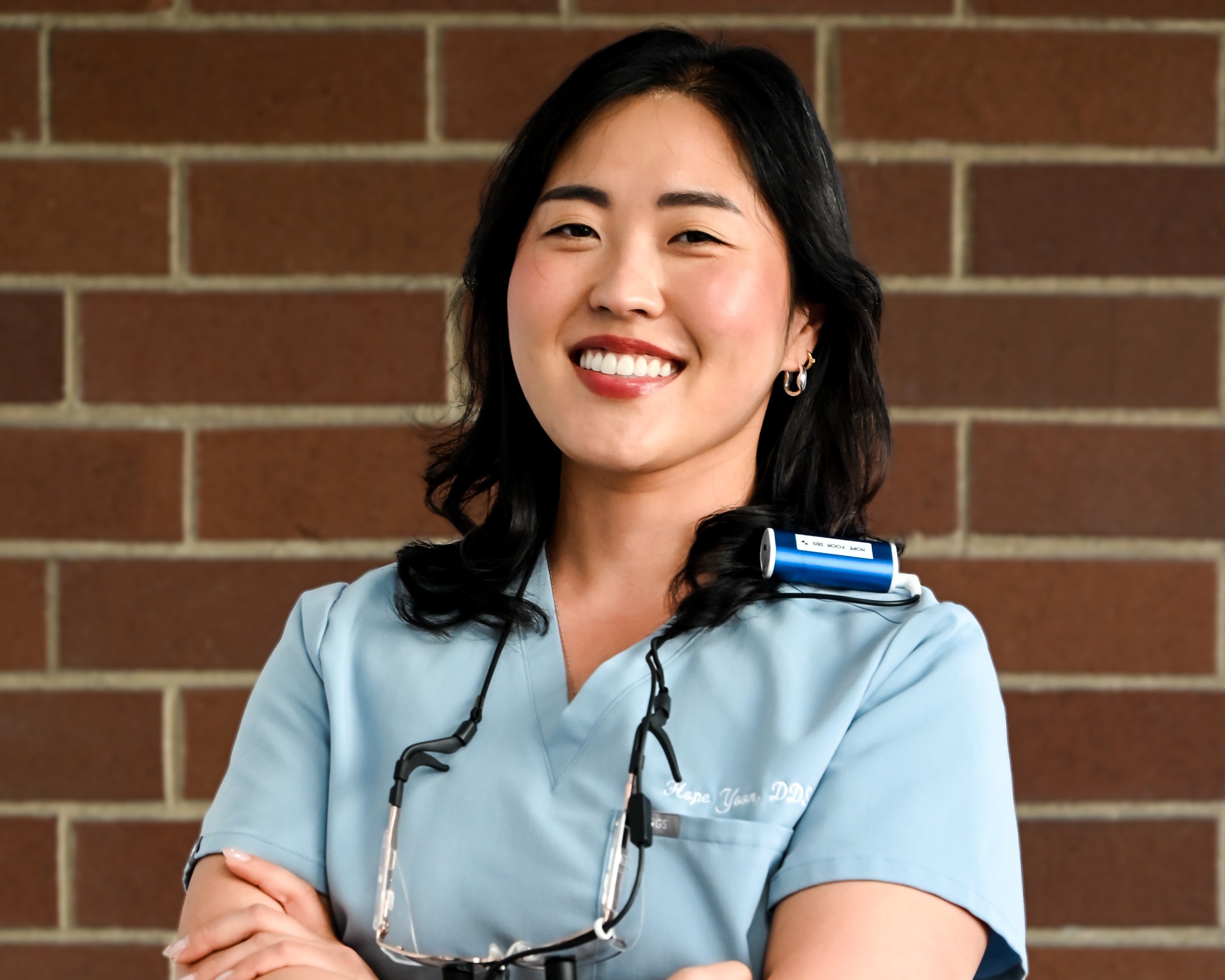 Local dentist smiling in the practice