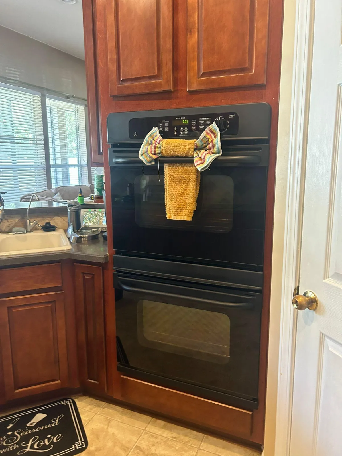 A well-maintained kitchen counter with a clean view of the appliances in Jacksonville.