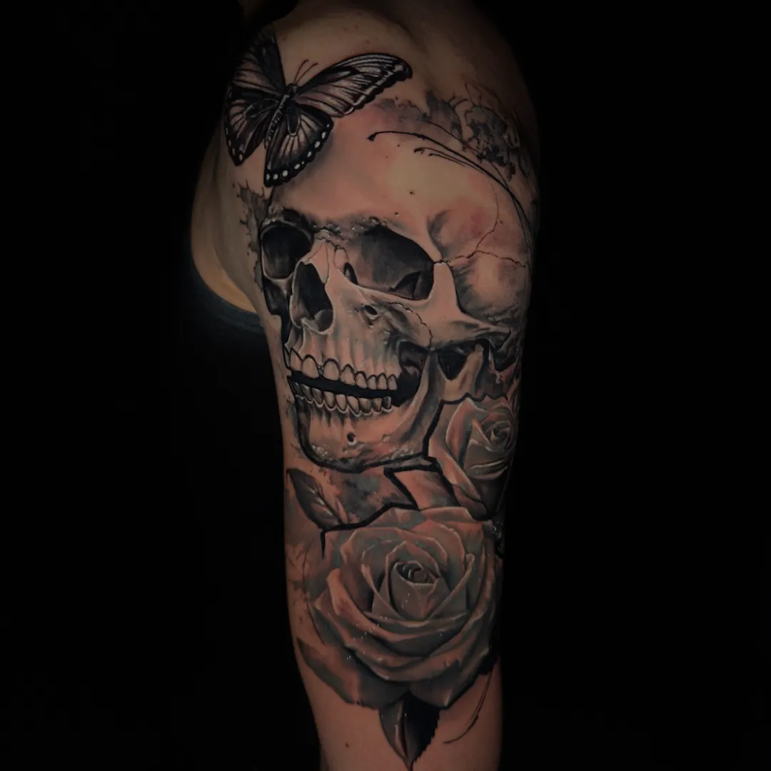 Tattoo by Santo Cuervo Tattoo Collective