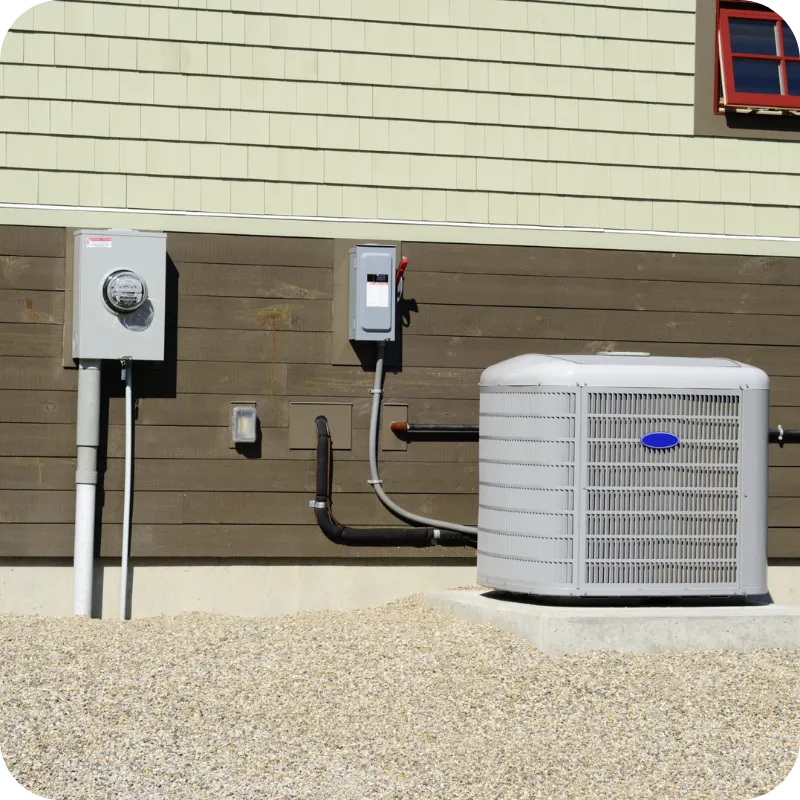 Outdoor HVAC unit and electrical connections inspected for maintenance, dust buildup, and water heater safety in Delaware homes.