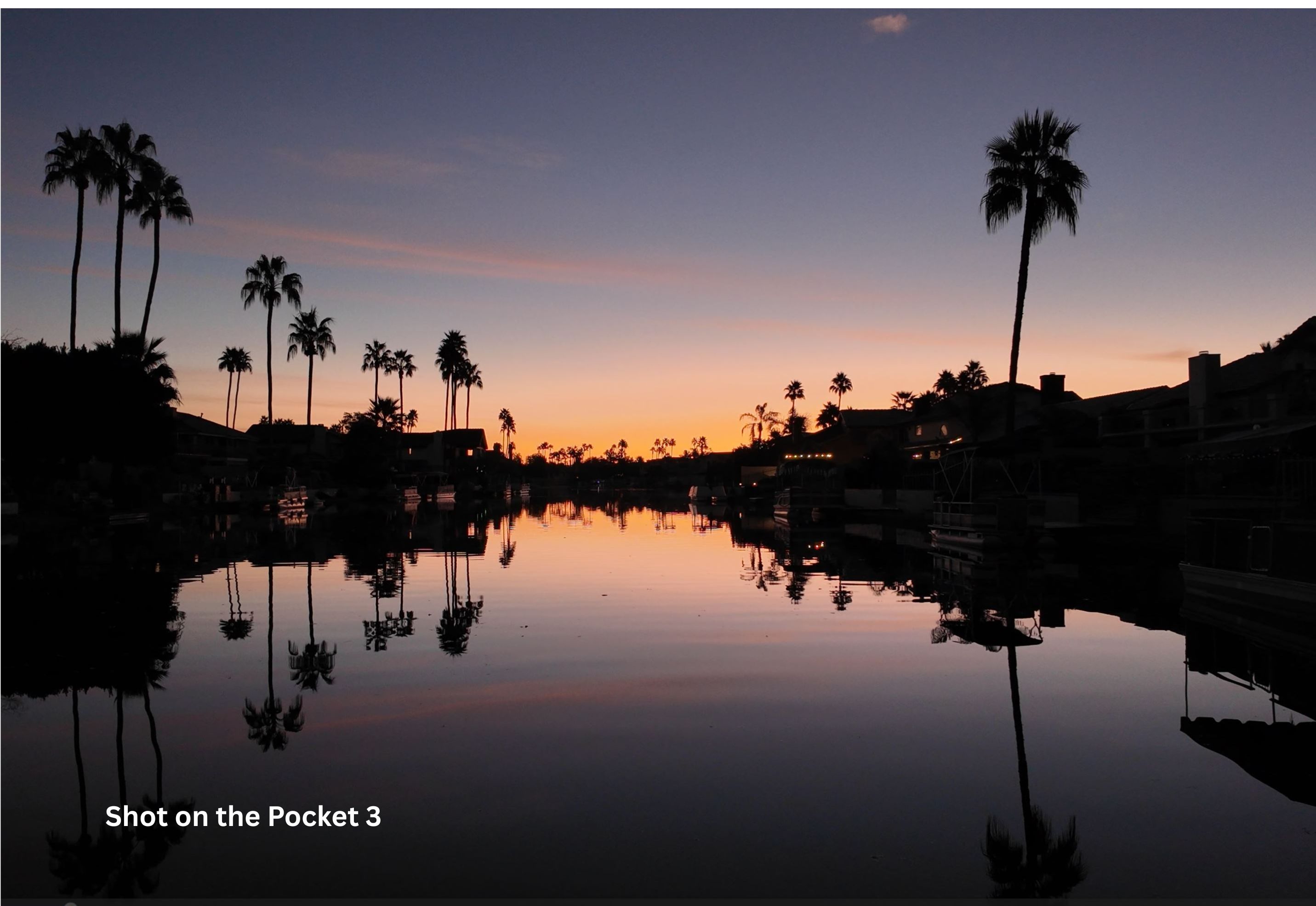 Traveler filming sunrise beach with DJI Pocket 3 and a crisp, stabilized shot on screen.