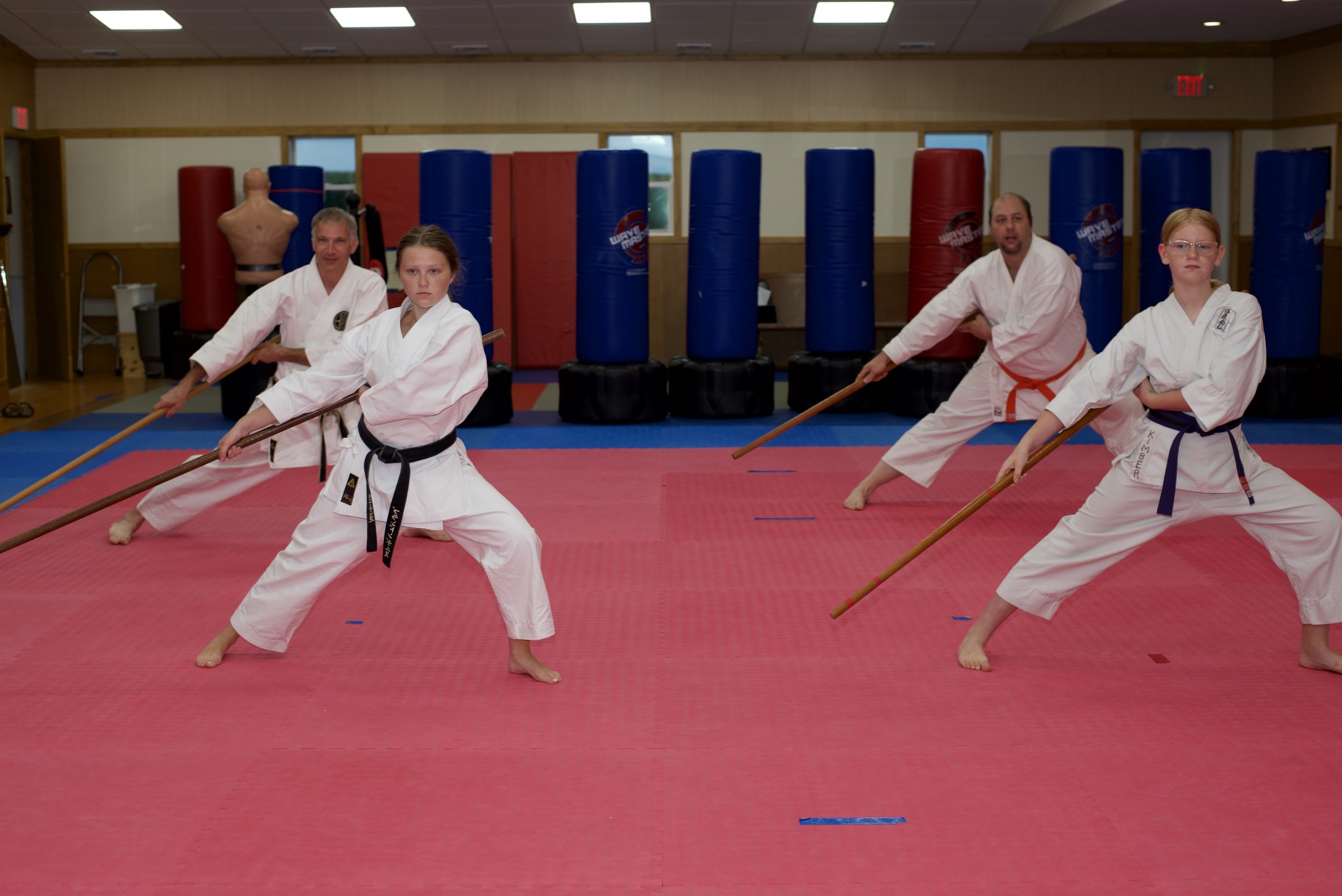 children participating in martial art sparring