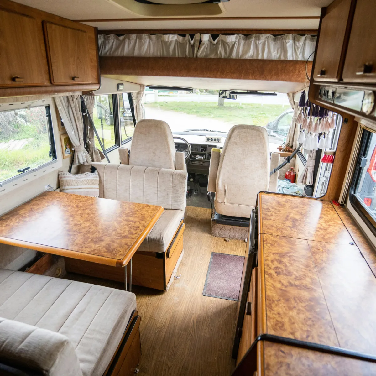 photo of an RV dealer's lot with different classes of RVs