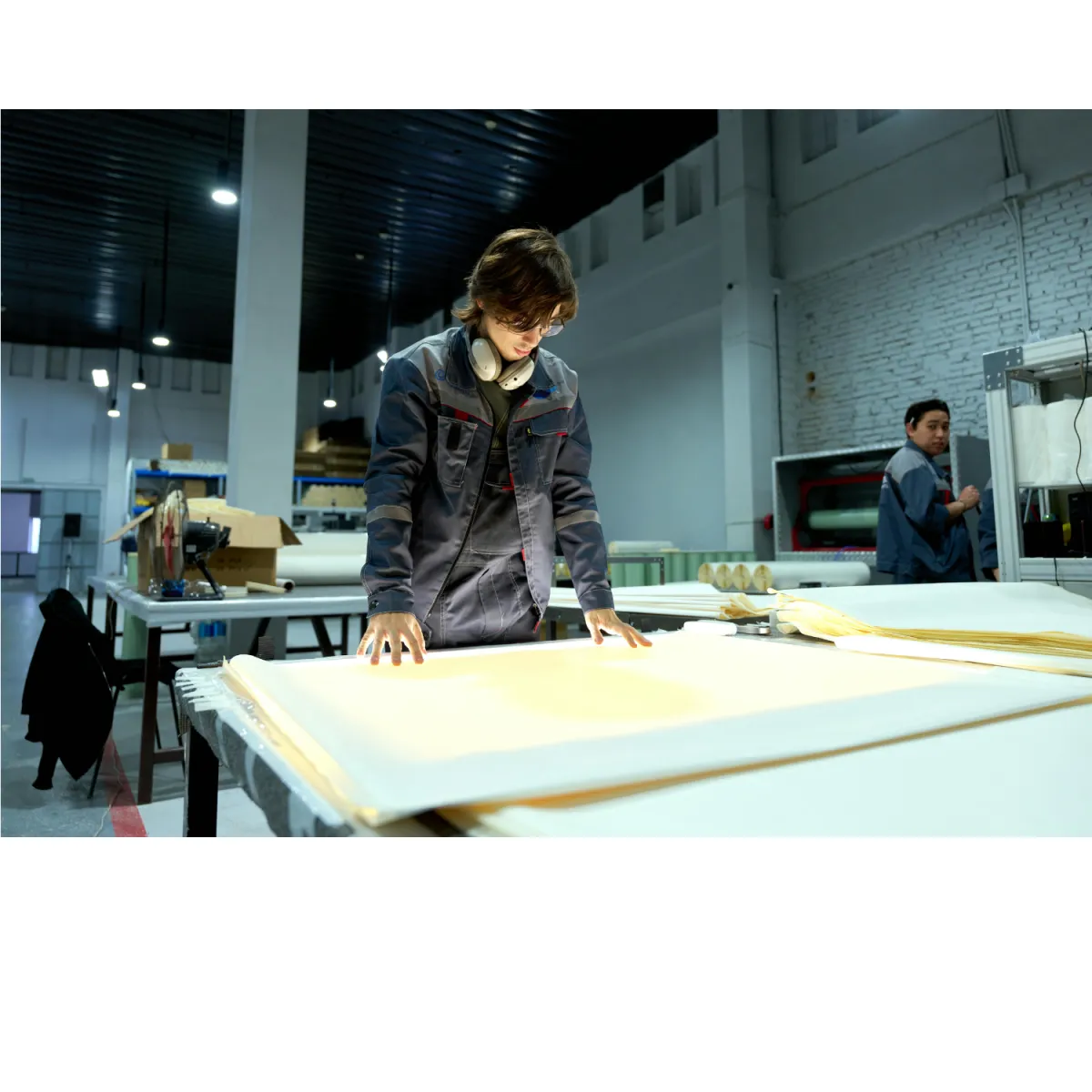 Female RV salesperson shaking hands with a male customer