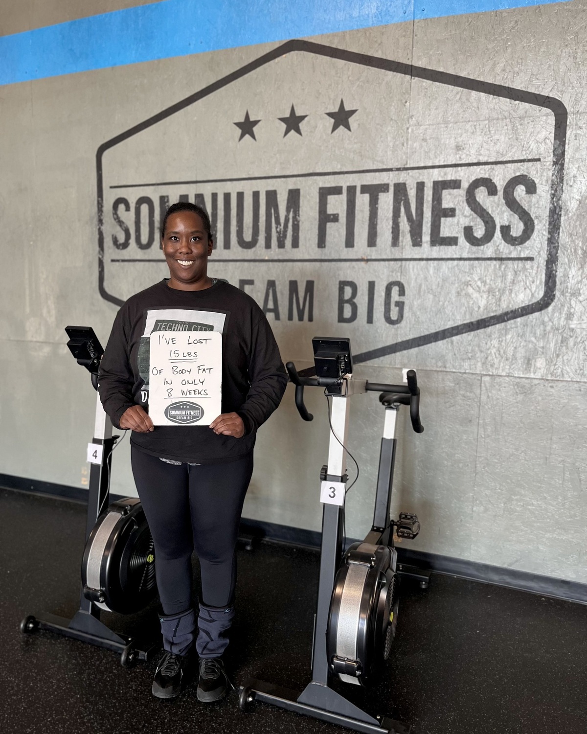 Somnium Fitness member April celebrating 15 pounds lost in eight weeks