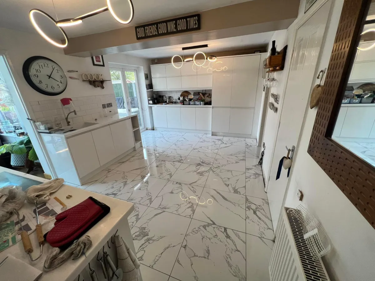 Flawless paint finish on newly plastered walls in Newport home renovation