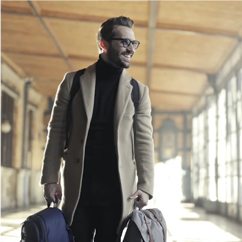 man carrying luggage