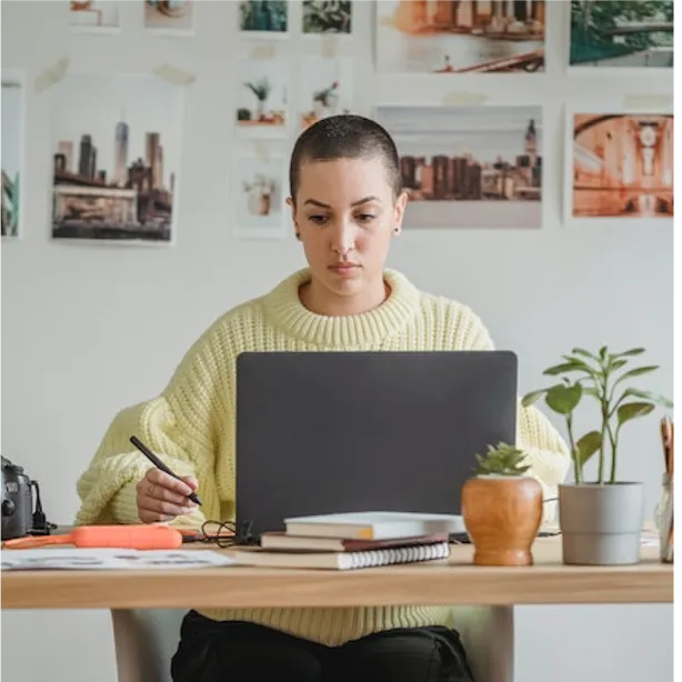 focused woman on laptop