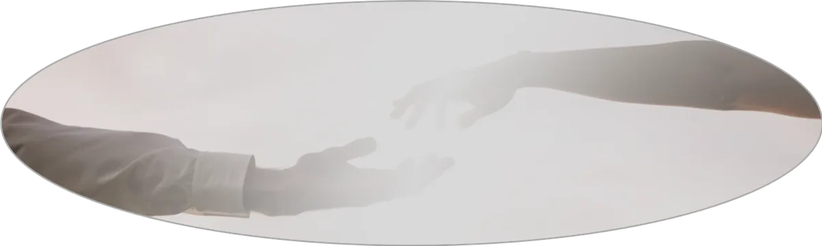 two faded hands and arms letting go of each other