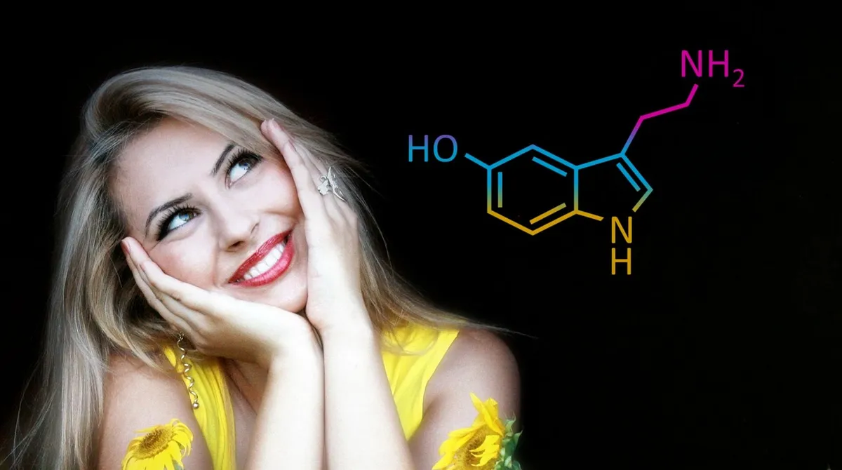 smiling woman in yellow dress with serotonin chemistry representation