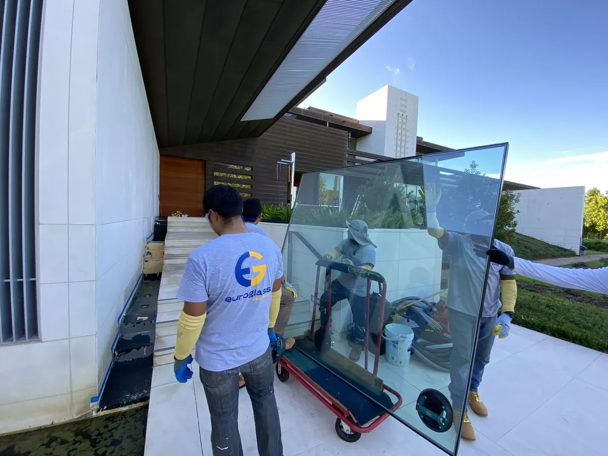 Euro Glass team installing a large glass pane