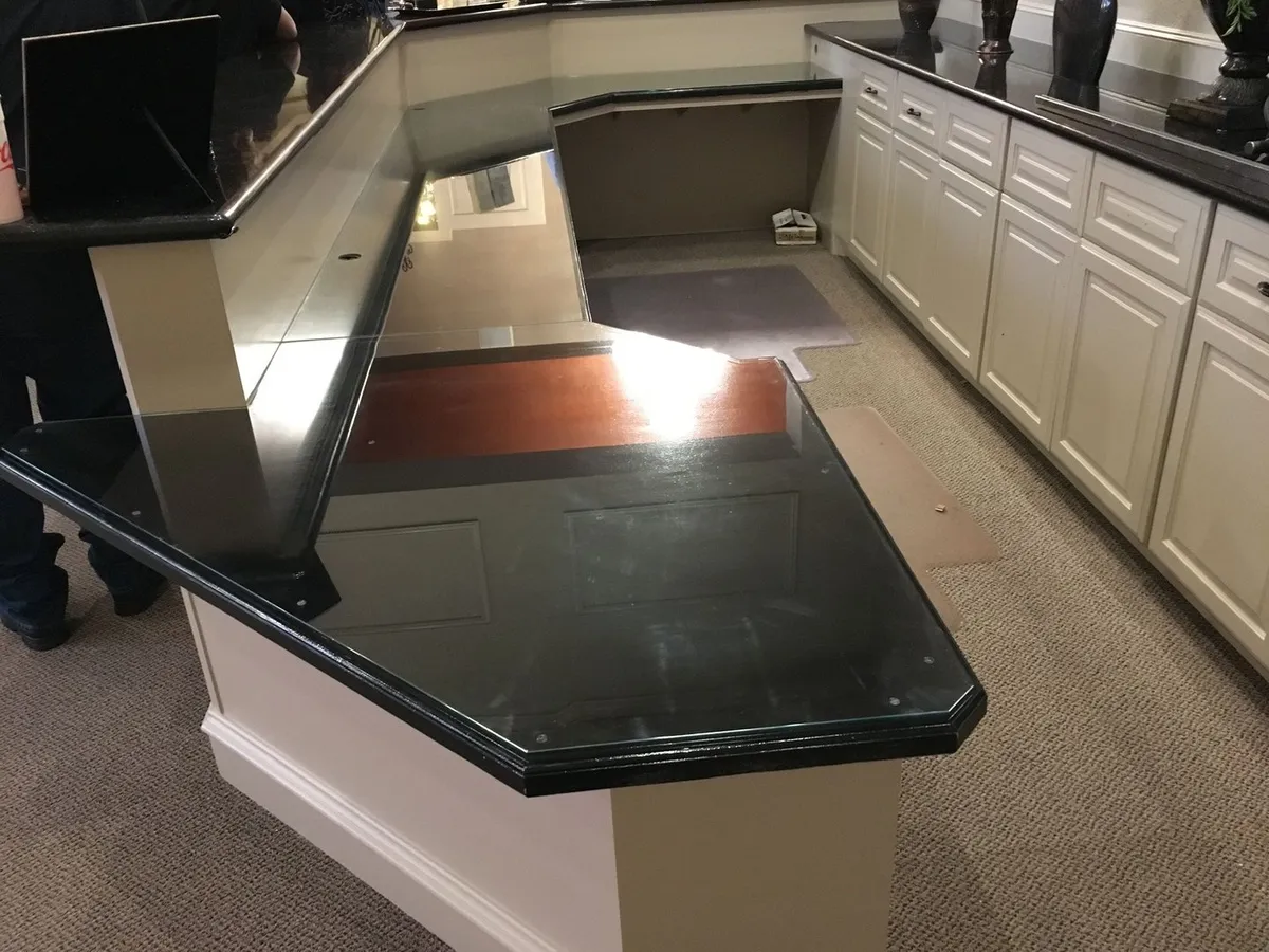 Custom-cut glass top on a kitchen counter
