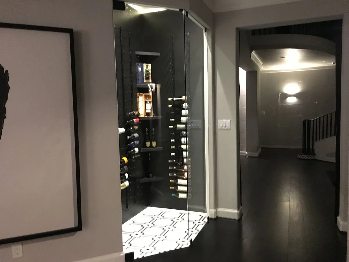 Glass-enclosed wine cellar in a modern home