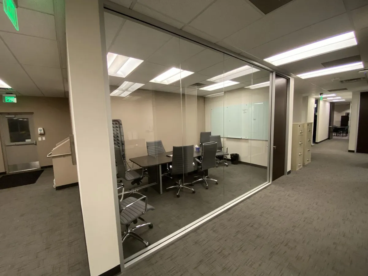 Glass-walled office with RACO-style framed glass