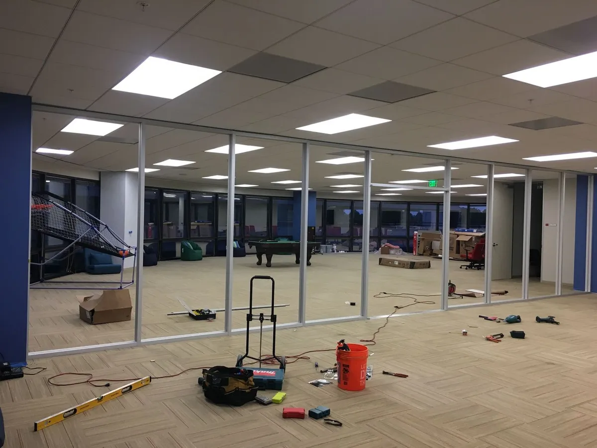 Interior glass storefront framing in a commercial buildout