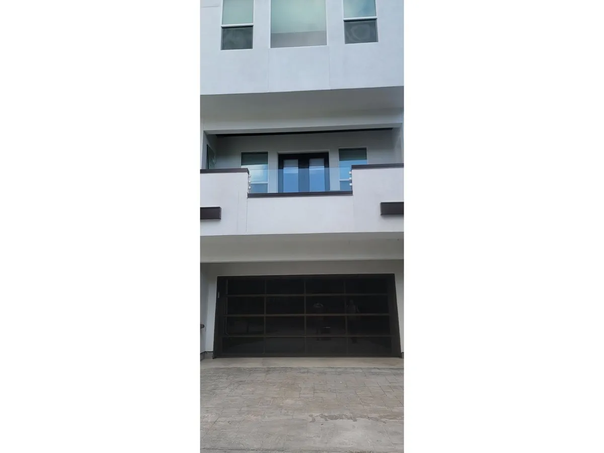 New construction townhome with glass railings