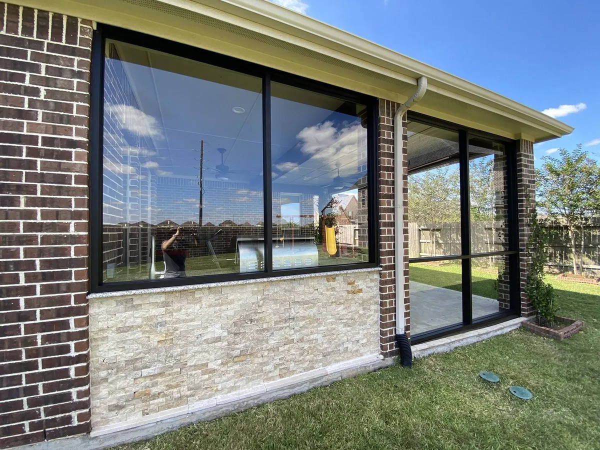 Patio enclosed with large glass panels