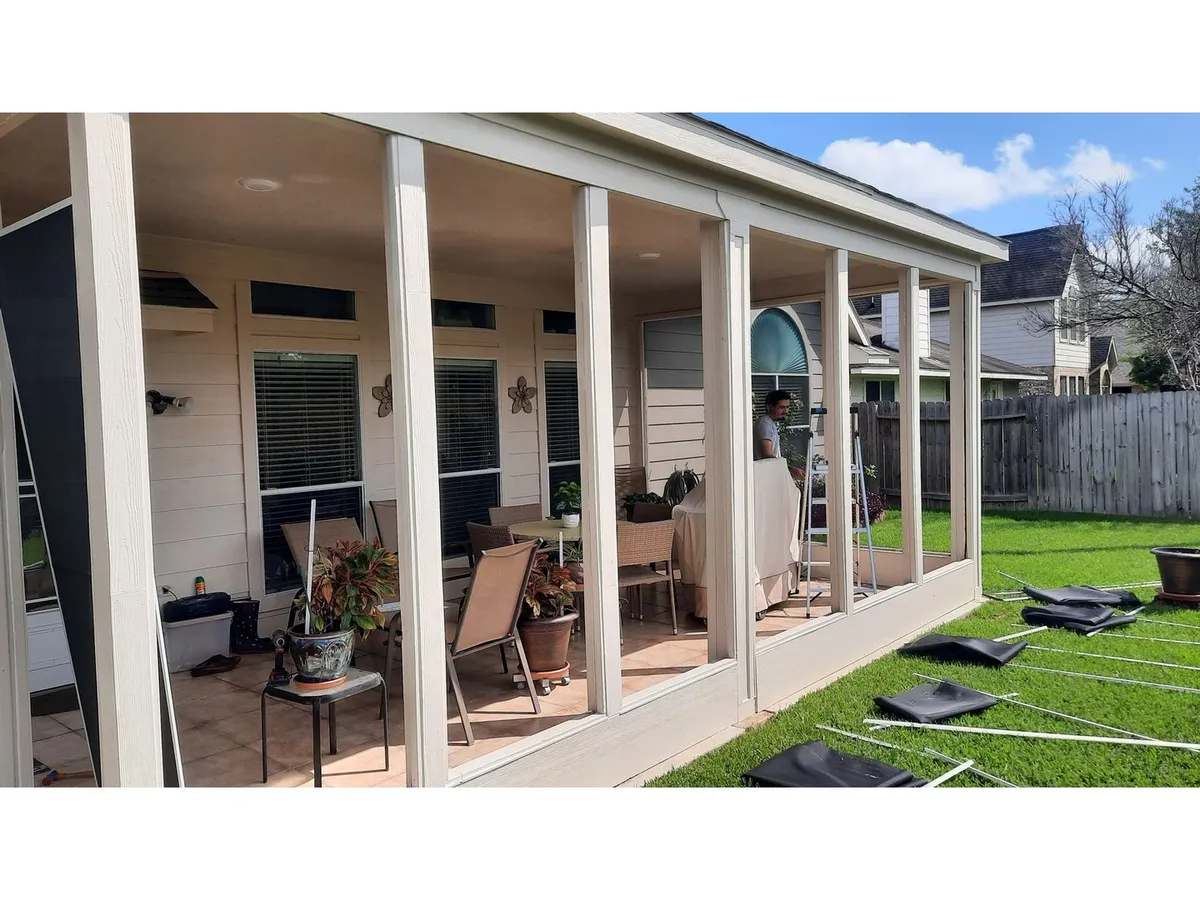 Patio enclosed with solar screens
