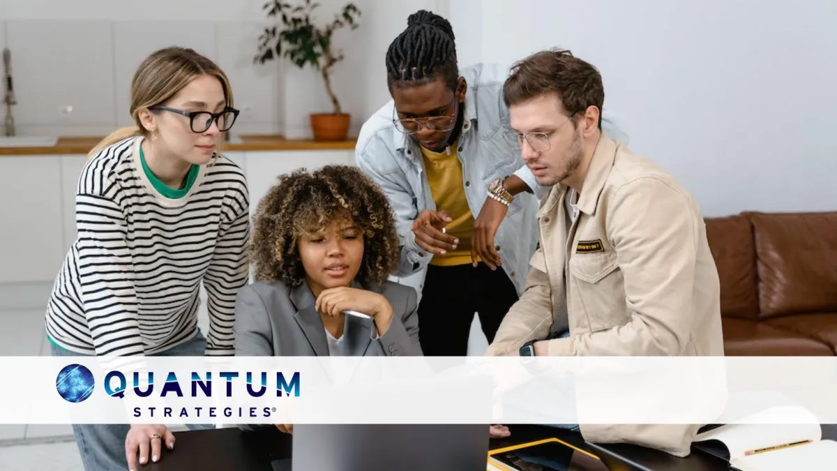 Team of diverse professionals collaborating on a project, representing innovation, strategy, and teamwork in HR Transformation, technology, and financial consulting at Quantum Strategies.