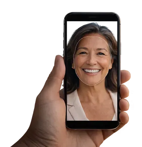 Woman smiling looking at tablet with dental implants