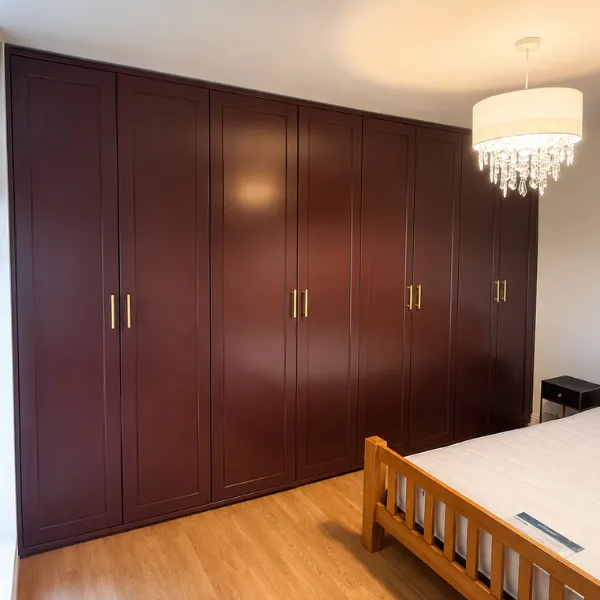 Modern bedroom with burgundy wardrobe wall