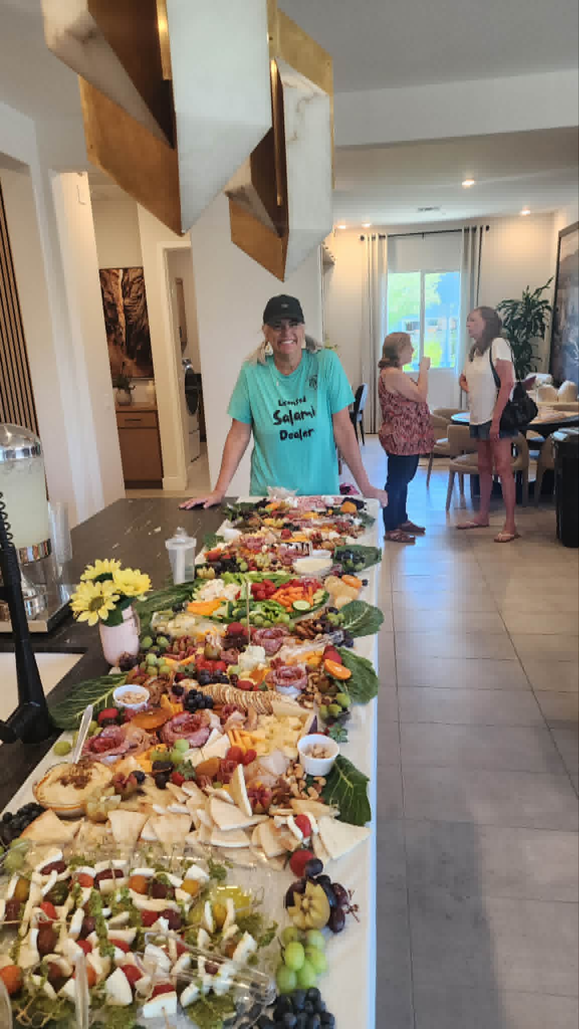 Founder presenting a handcrafted charcuterie board