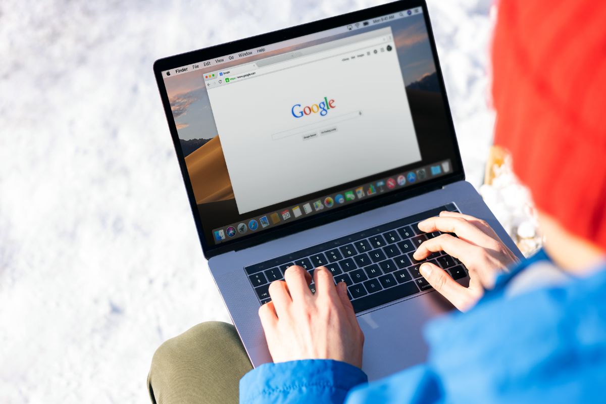 Person searching online for funeral home services