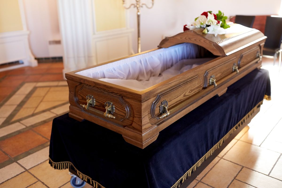 Wooden casket displayed for a funeral or memorial service