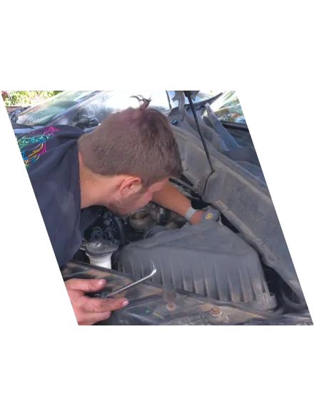 Hunter Hutton, owner of Jax Cruisers, working on a car.