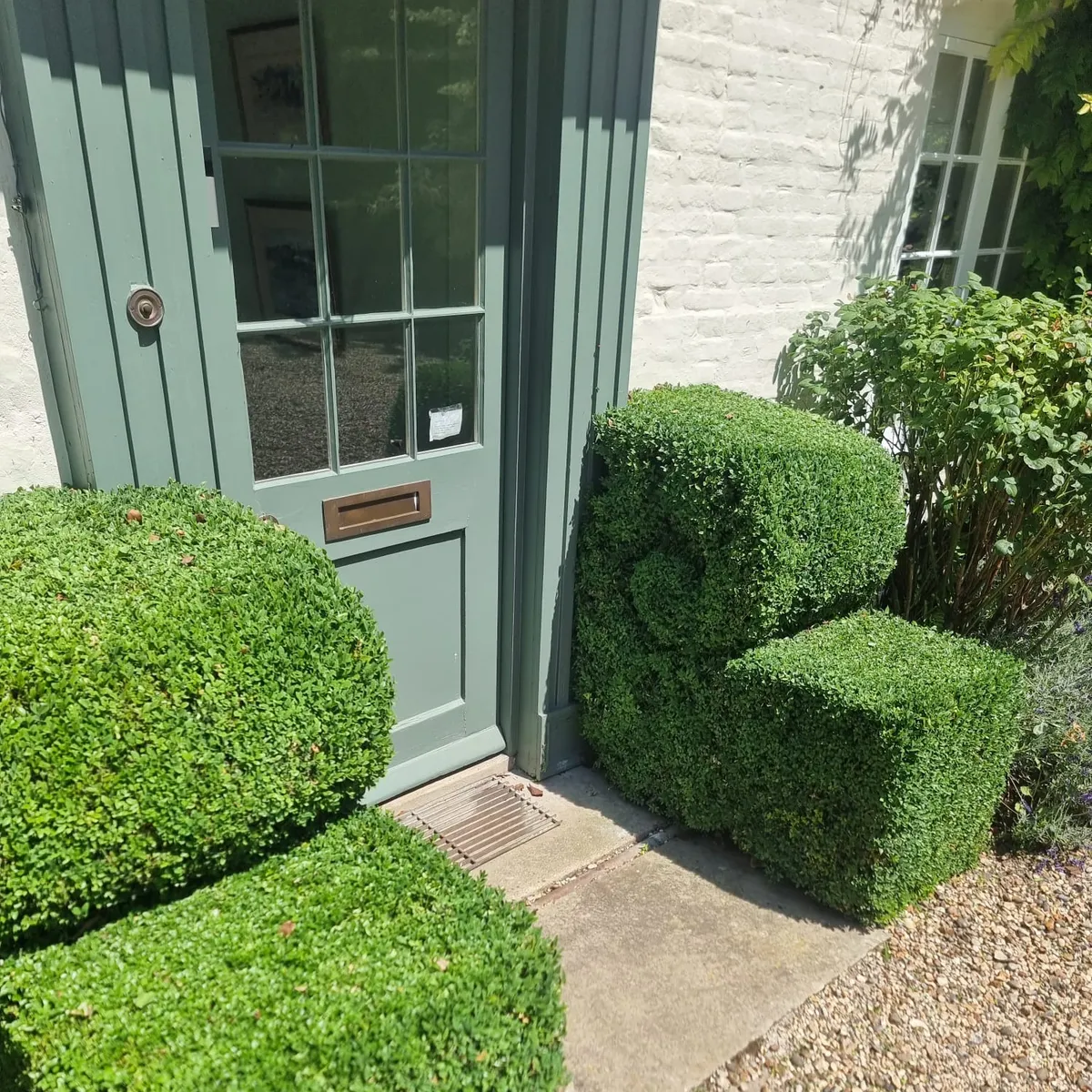 Garden gate installation in Ipswich with a timber side gate hung on a fence