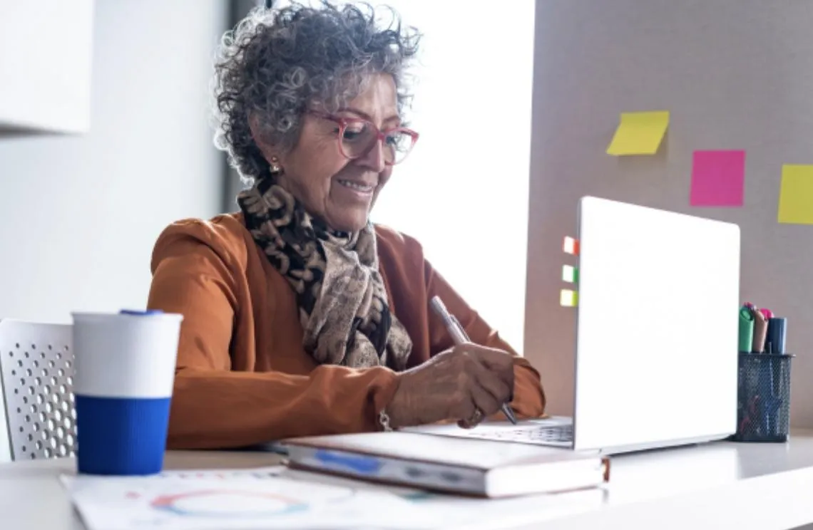 Canadian senior reviewing reverse mortgage pros and cons at home