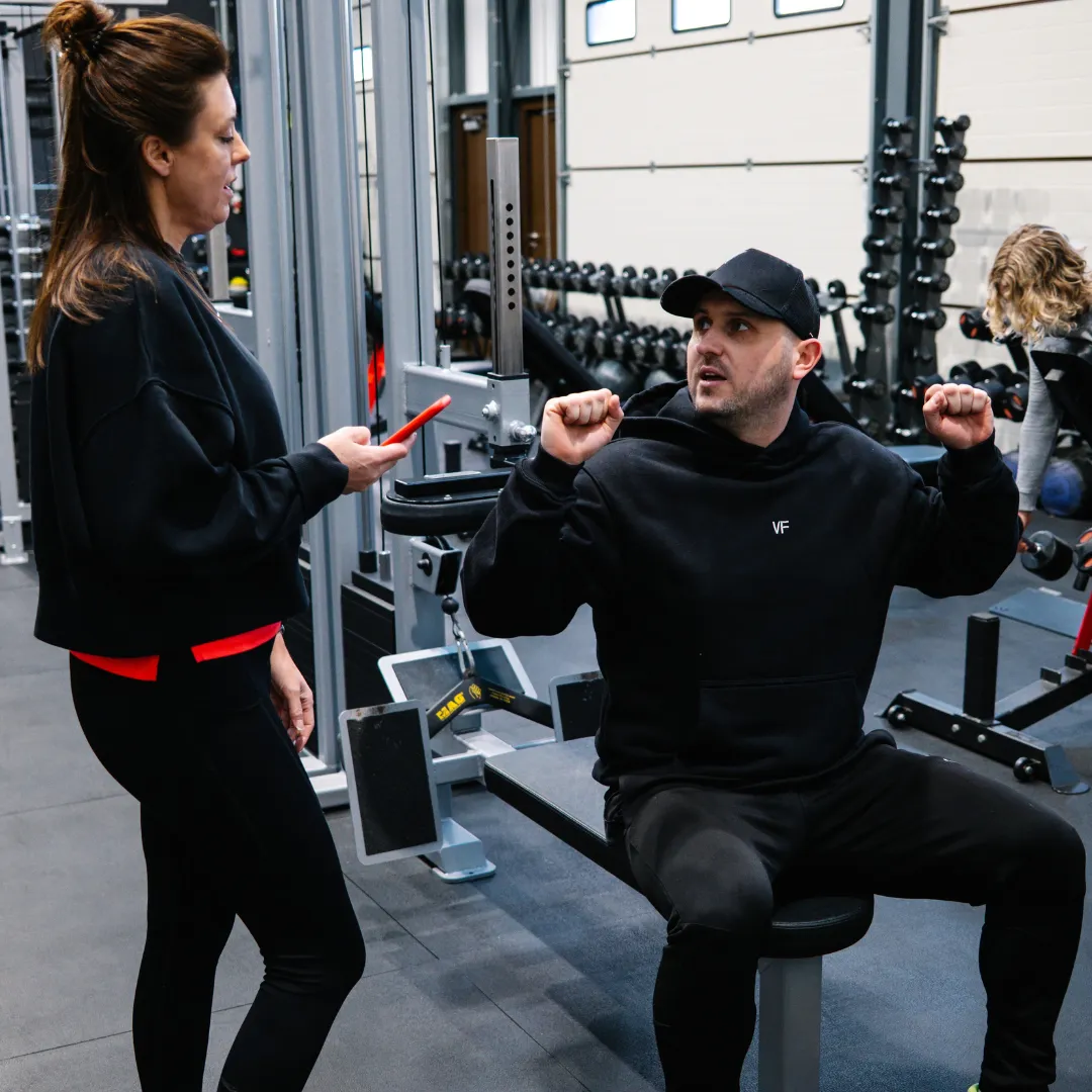 Man running with headphones in a forest
