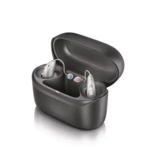 unitron hearing aids in a charger