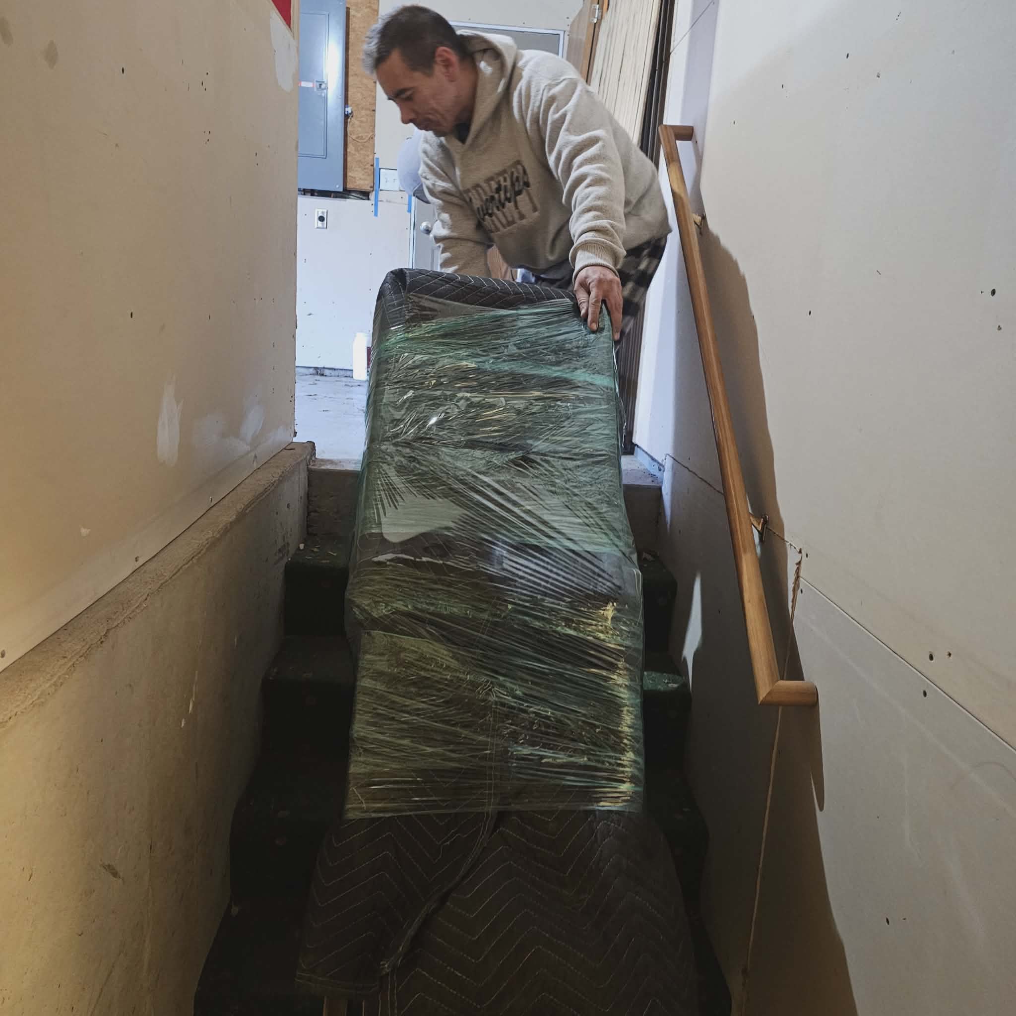 A red and white plane flying in the sky