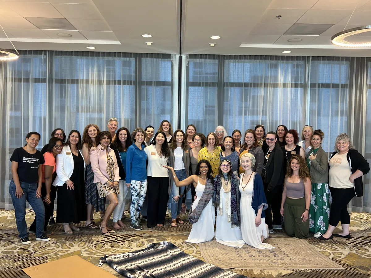 Aria Tau facilitating an intimate gathering of women