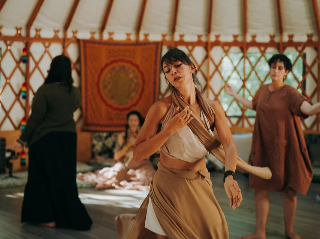 Aria Tau facilitating an intimate gathering of women