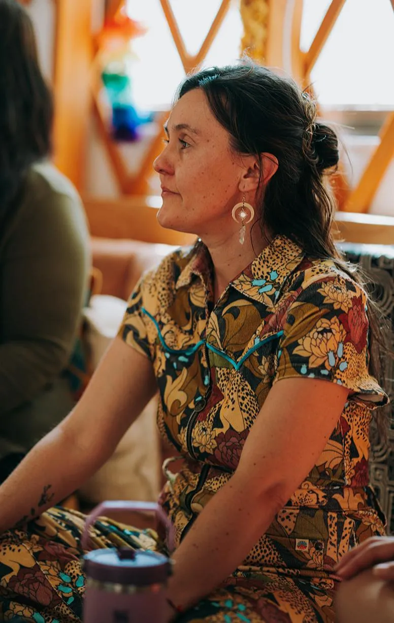 Aria Tau facilitating an intimate gathering of women