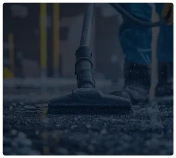 High-pressure driveway cleaning and oil stain removal.