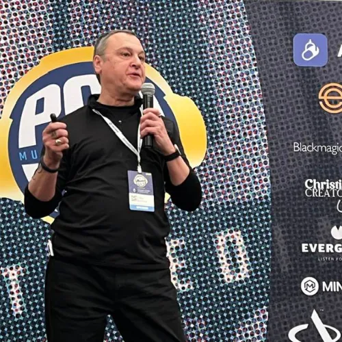 Portrait of a confident instructor, studio lighting, neutral clothing, no background