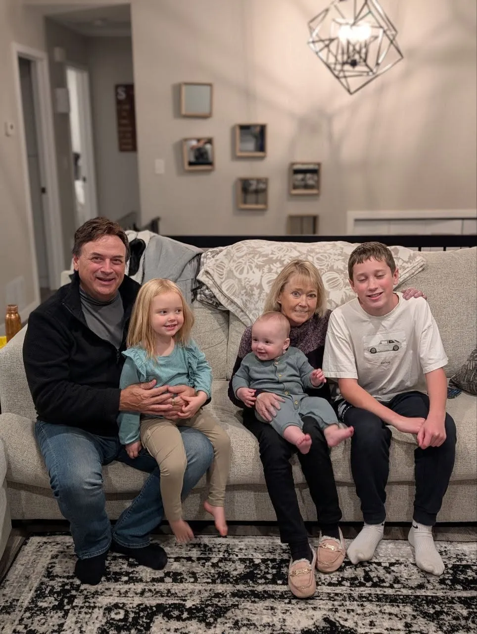 Grandparents with their grandchildren at home