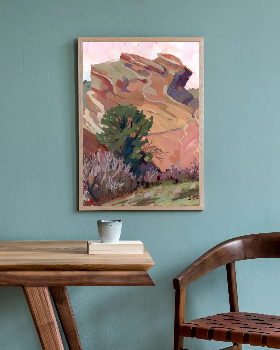 Framed painting styled in a calm living room