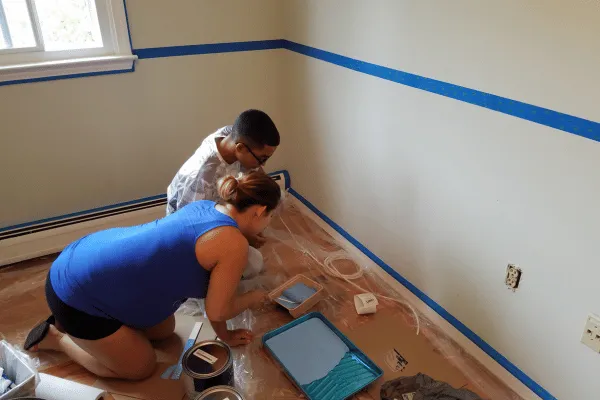 Maria and Jay painting - green pear homes, about us, we buy houses, sell your house fast, cash home buyer
