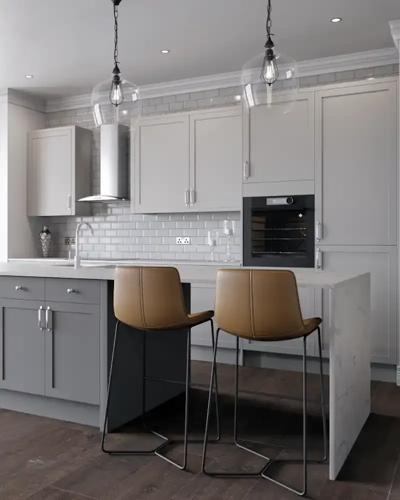 Light and airy bespoke kitchen with cream painted Shaker cabinets, tongue and groove island panelling, wooden worktops, range cooker with white metro tiles, and natural light from roof windows - Blueprint Kitchens Cornwall