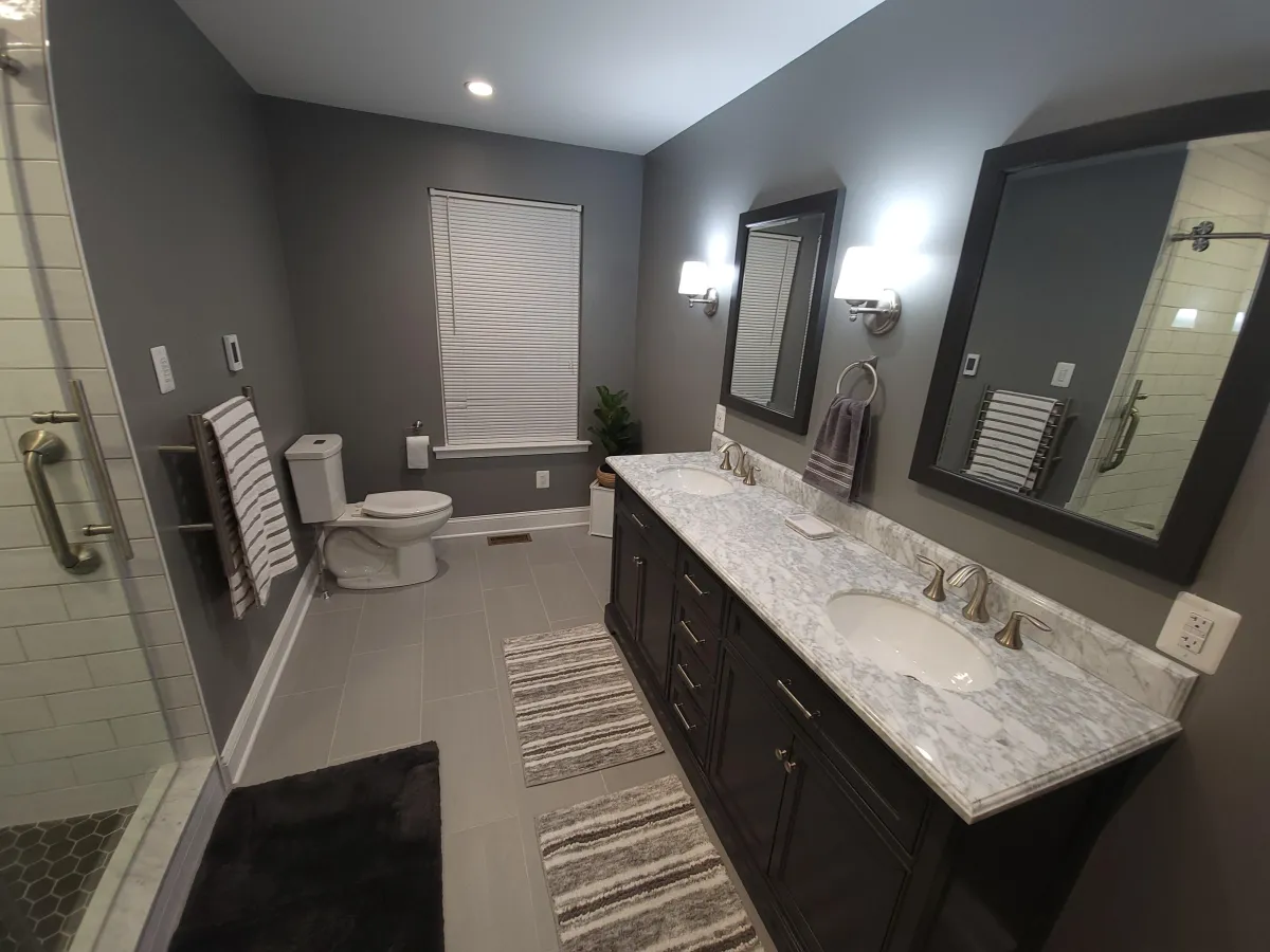 Double sink white vanity bathroom remodel in Montgomery County